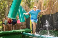 Active Man overcoming obstacle course