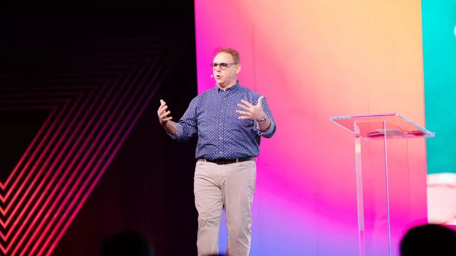 Matt Hiller speaking on stage