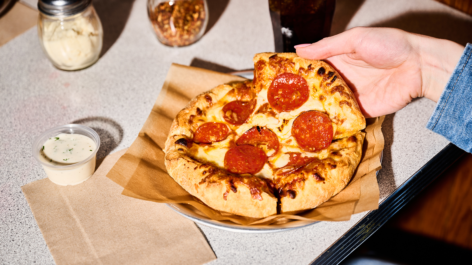 CJ Schwans Villa Prima Personal Pepperoni Pizza Slice at Table