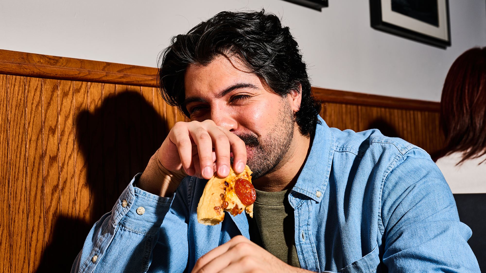 CJ Schwans Villa Prima Customer Eating Personal Pizza