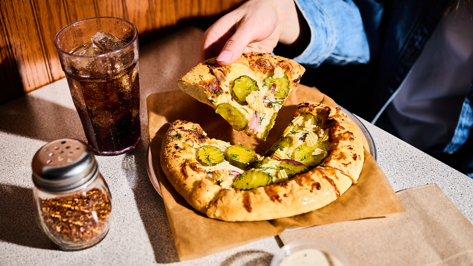 CJ Schwans Villa Prima Personal Pizza Slice at Table