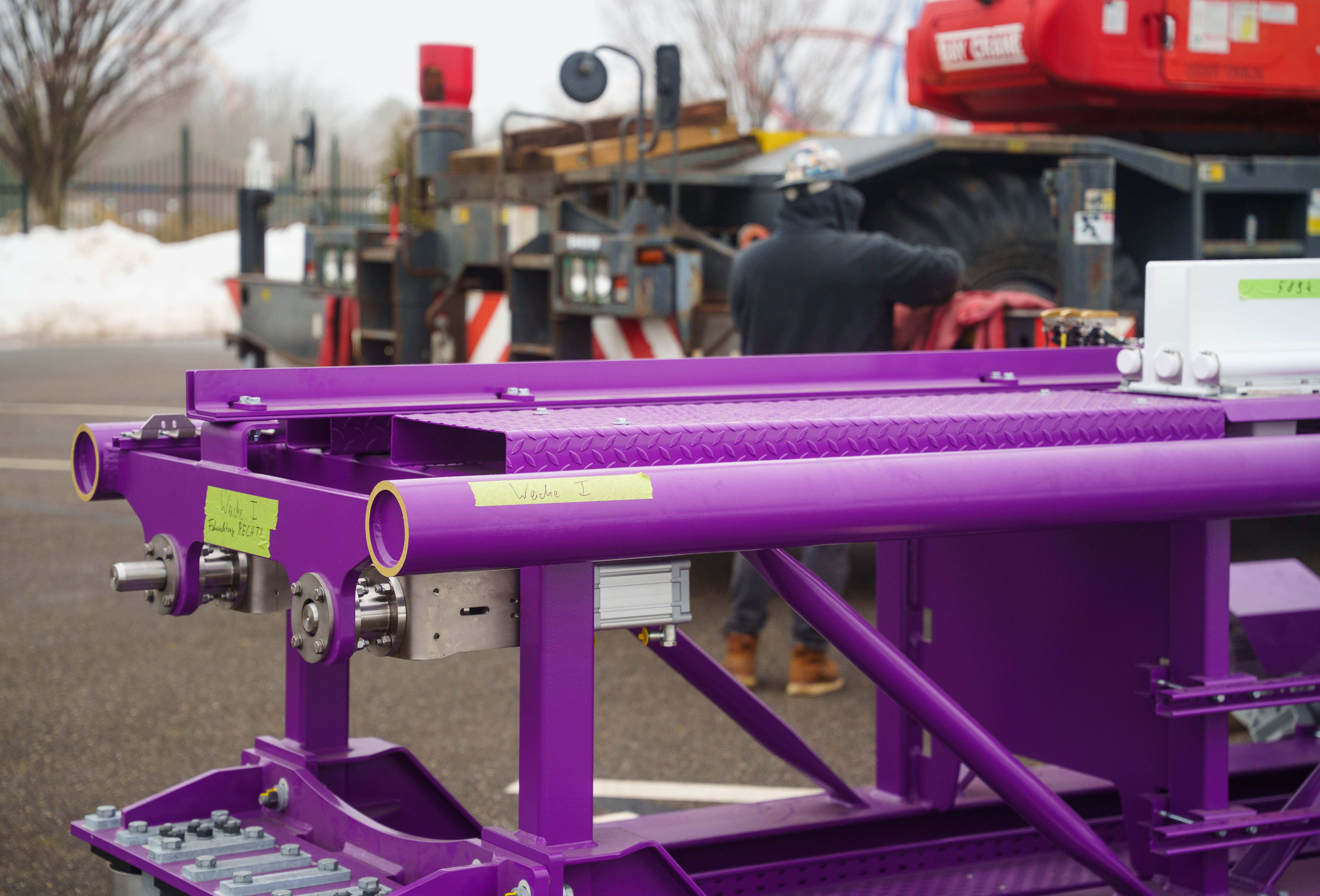 Close-up image of the new purple track that will form Six Flags Great Adventure's new-for-2027 roller coaster.