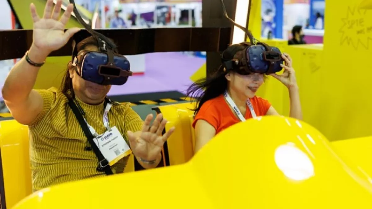 Women on VR ride at Expo Asia