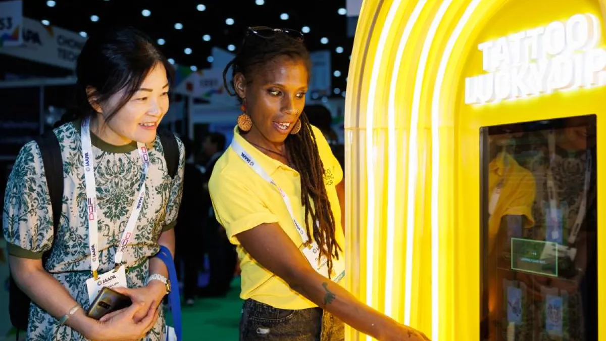 Women showing booth at Expo Asia