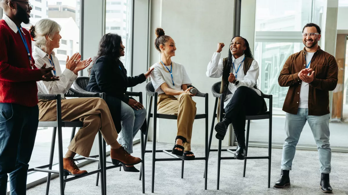 Diverse professionals talking at an education session