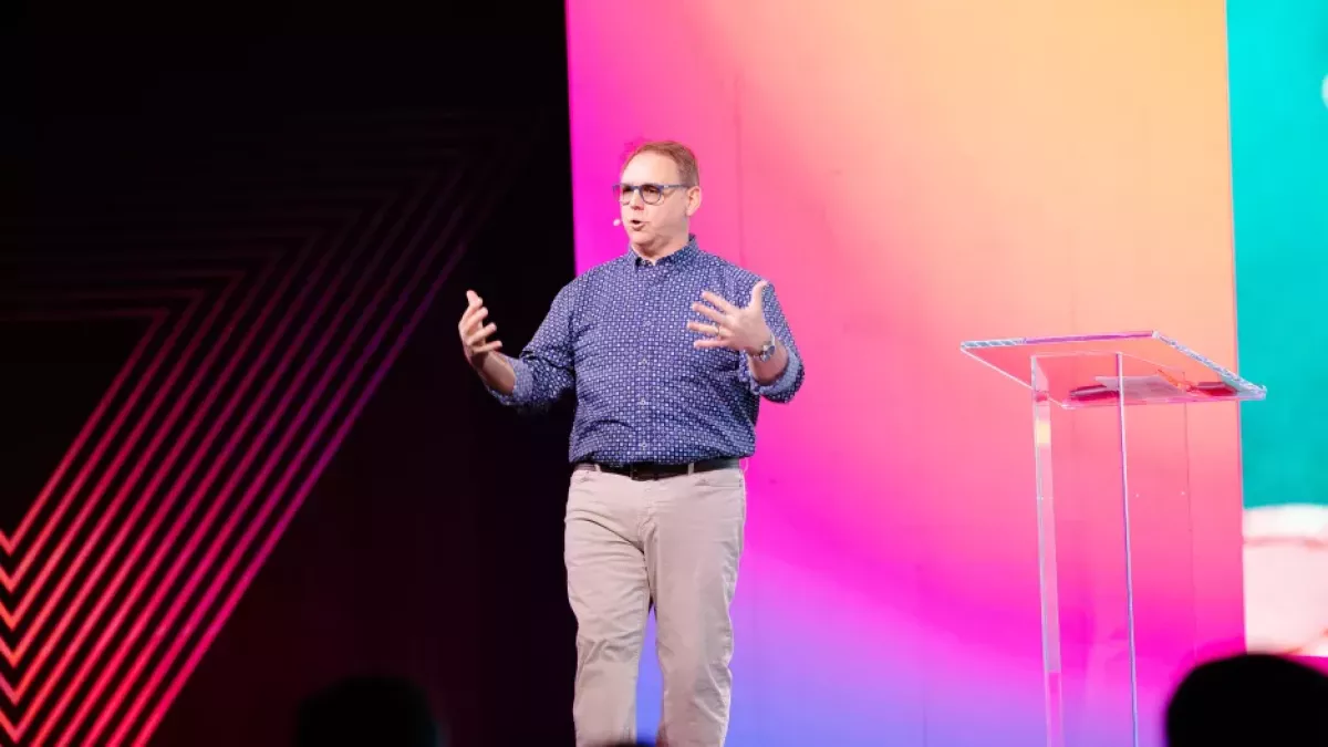 Matt Hiller speaking on stage