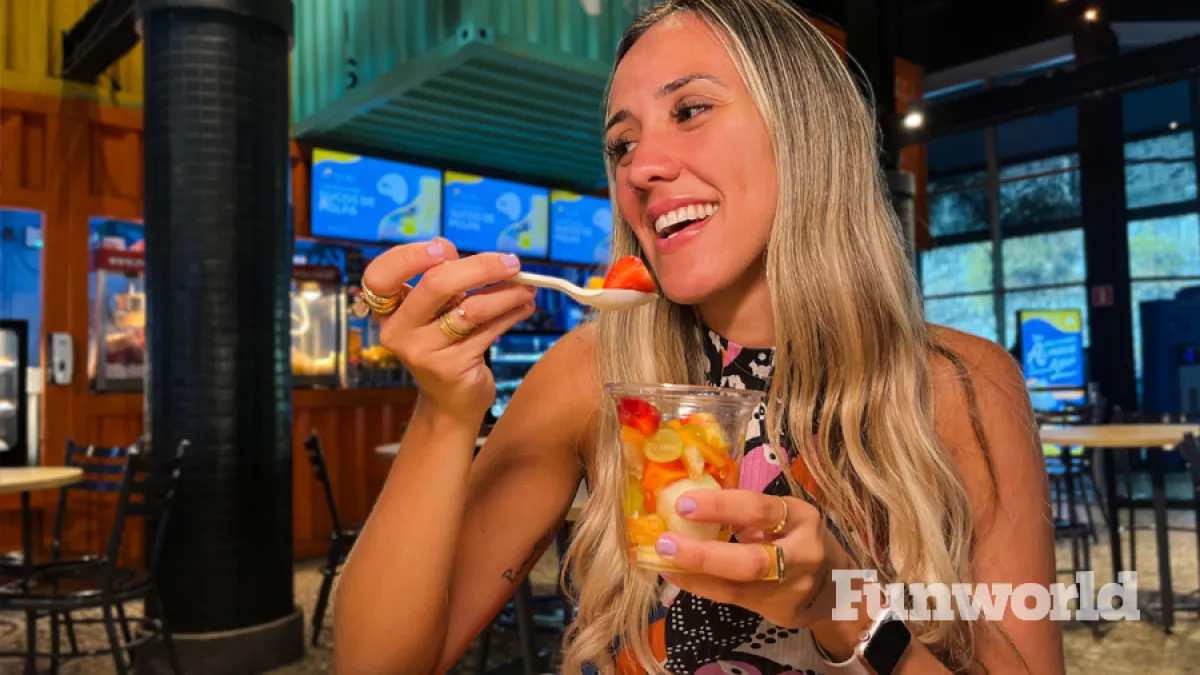 aquario woman eating a fruit salad