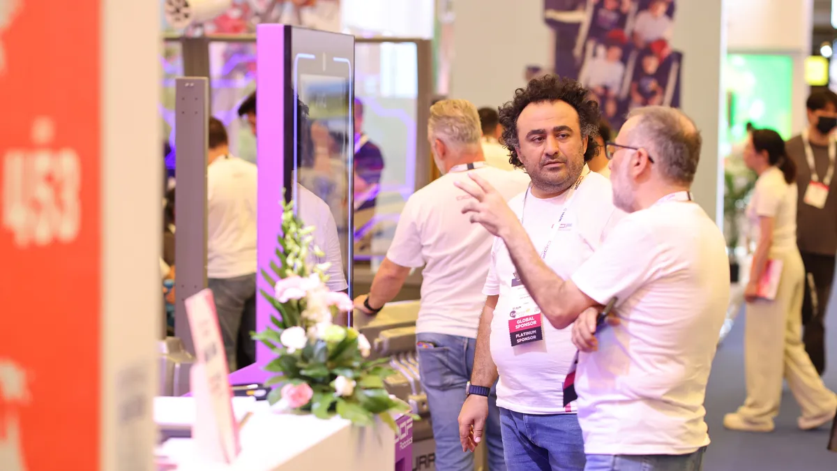 Attendees visiting an exhibitor booth during IAAPA Expo Asia 2025