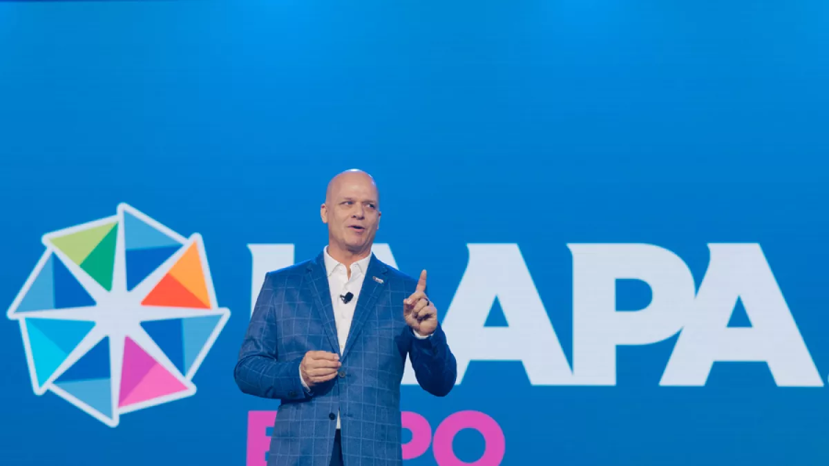 Person on IAAPA Stage