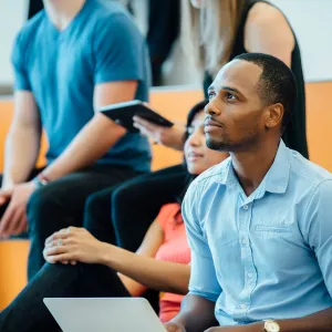 Group of People learning in an auditorium