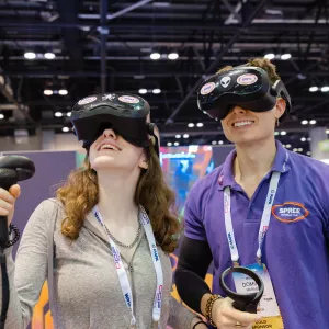 Two people using VR glasses