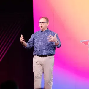 Matt Hiller speaking on stage