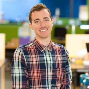 man wearing plaid button down 
