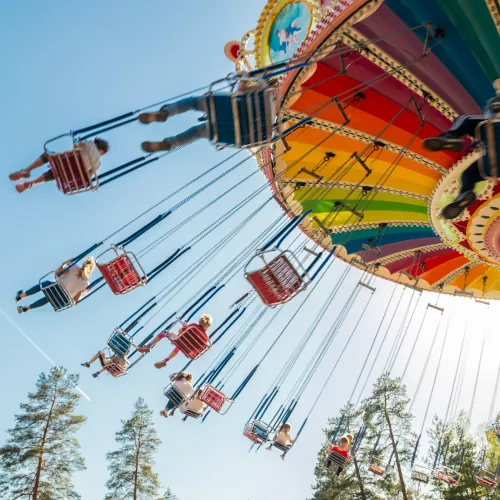 Swing Ride in motion at amusement park