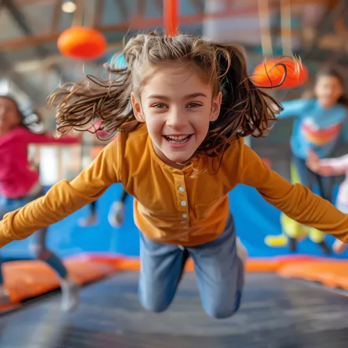 Family playing at a trampoline park