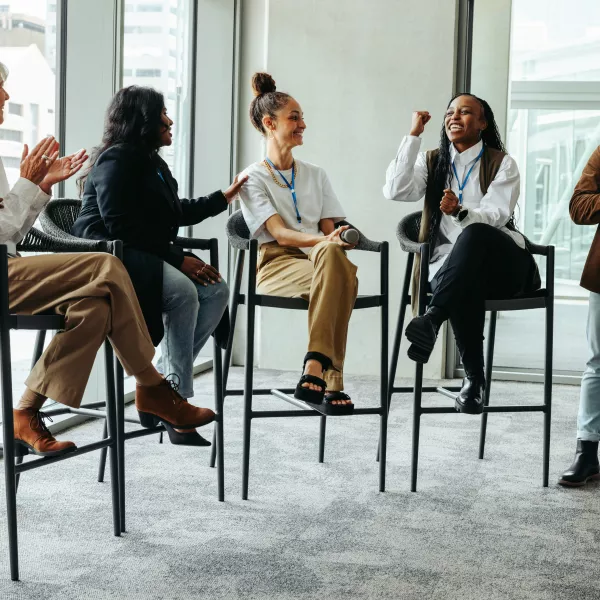 Diverse professionals talking at an education session