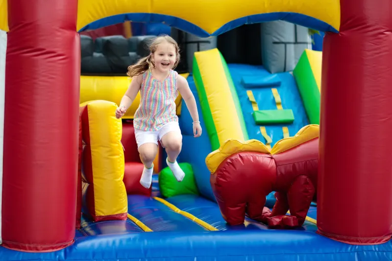 Child jumping on indoor trampoline