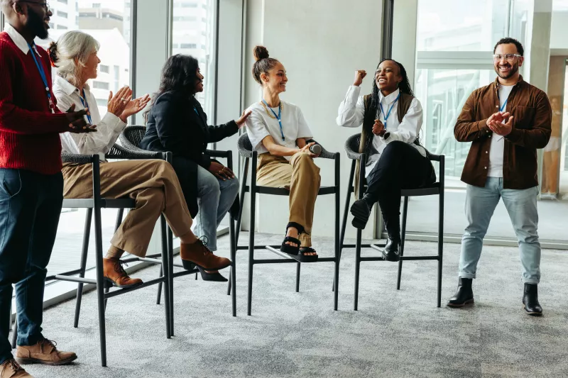 Diverse professionals talking at an education session