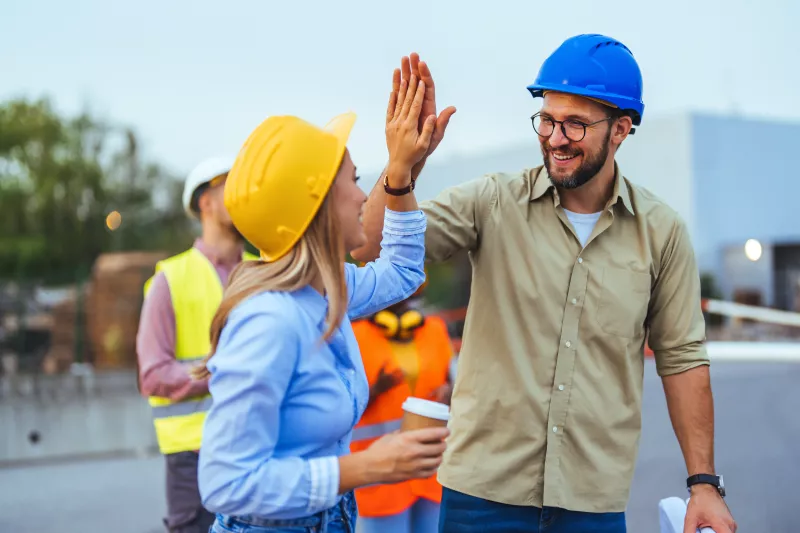 Construction Workers celebrating success
