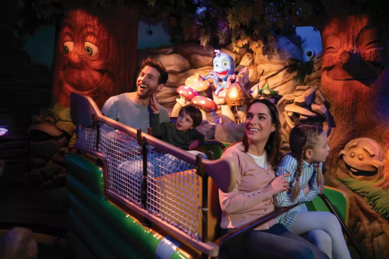 Family riding a water ride