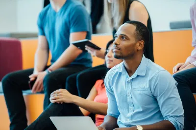 Group of People learning in an auditorium