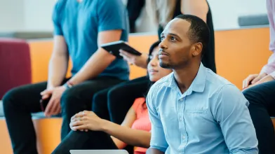 Group of People learning in an auditorium