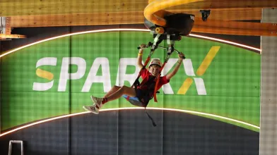 Young man using the zipline