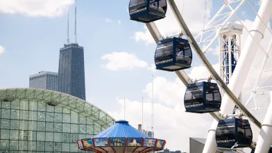 Centennial Wheel at Navy Pier in Chicago, with Carousel and Willis Tower in the background