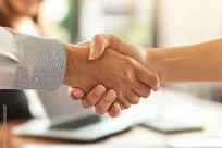 Two people shaking hands