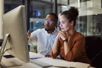 Two coworkers collaborating