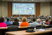 Officials discussing infrastructure at council meeting
