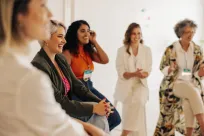 Multicultural women having a discussion in a room