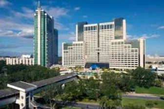 Two hotel buidlings with Orange County Convention Center in the distance