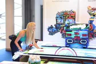 Attendee playing a game at IAAPA Expo Asia
