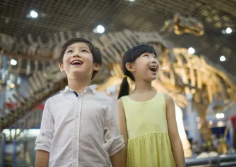 boy and girl enjoying a museum