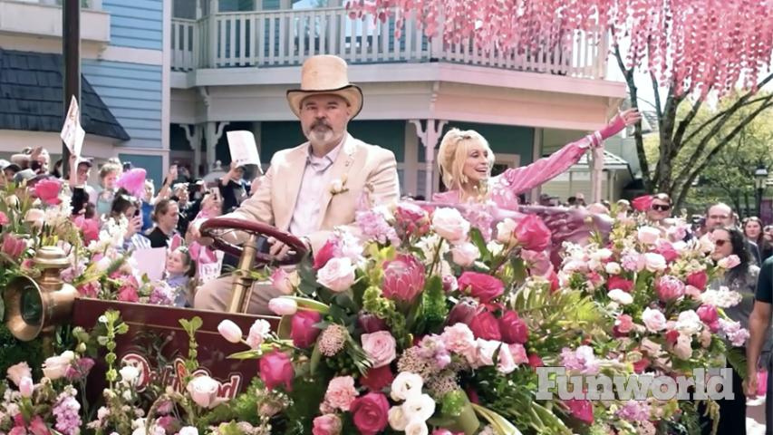 dolly parton at dollywood opening day parade waving to fans